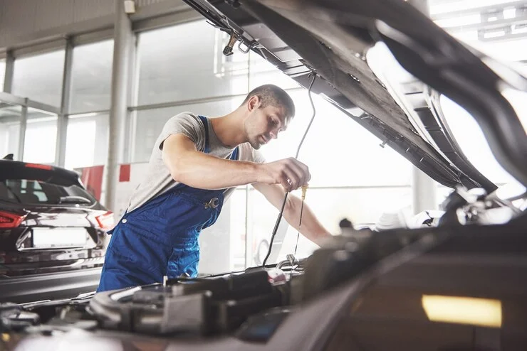 1 auto-mechanic-working-garage-repair-service_146671-19682