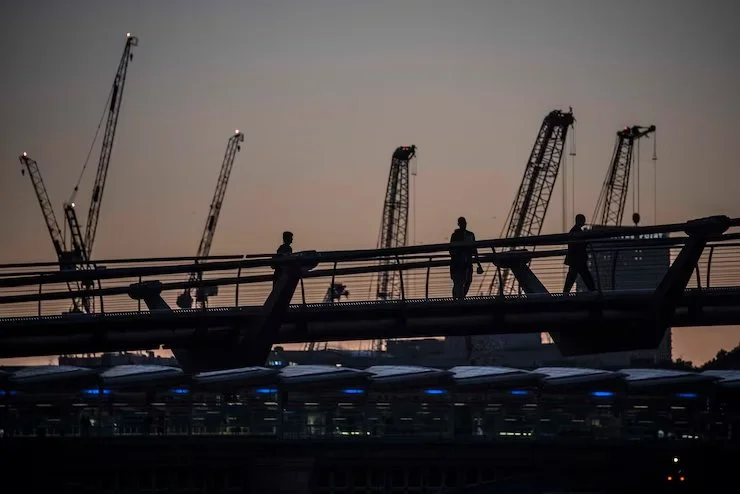 1 cranes-construction-site-against-sky-sunset_1048944-22745255
