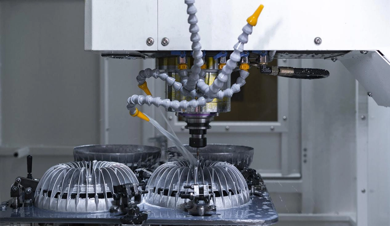 Close-up of an industrial CNC machining tool in operation